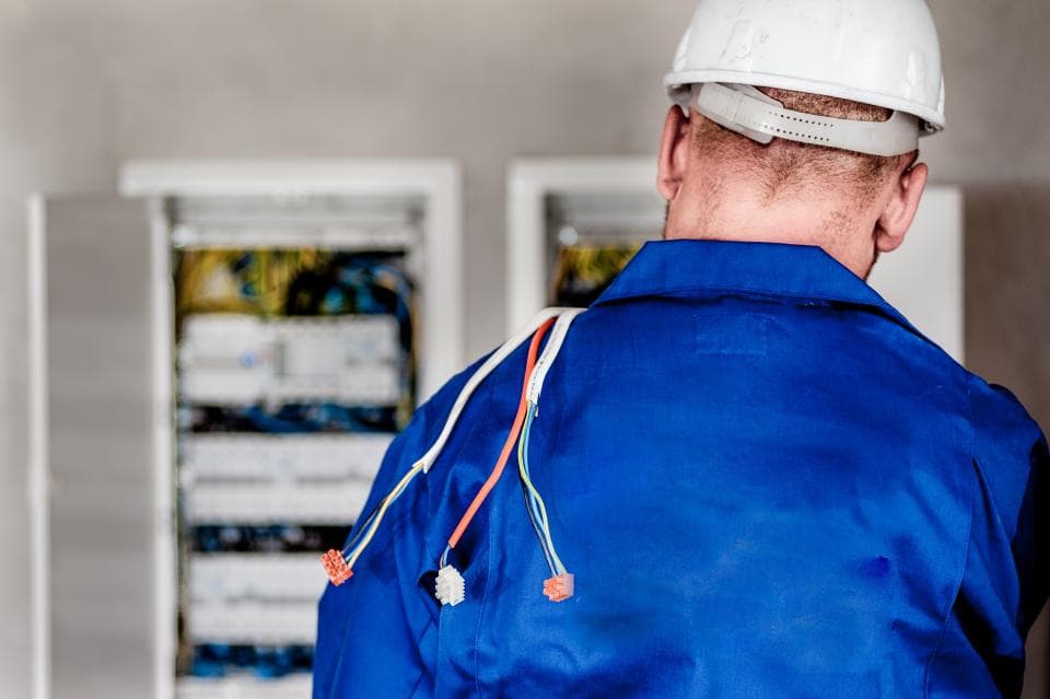 Ecosave Gas and Power business energy supported electrician installing a meter